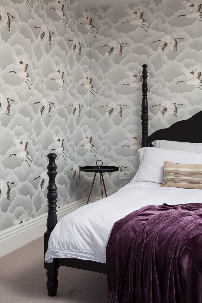 Patterned wallpaper in bedroom