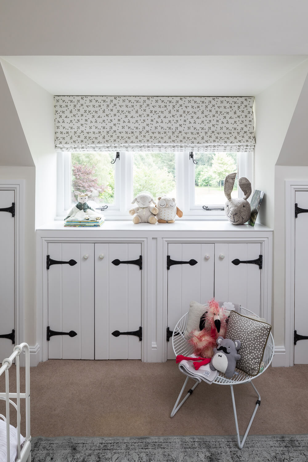 Window storage area in childrens bedroom